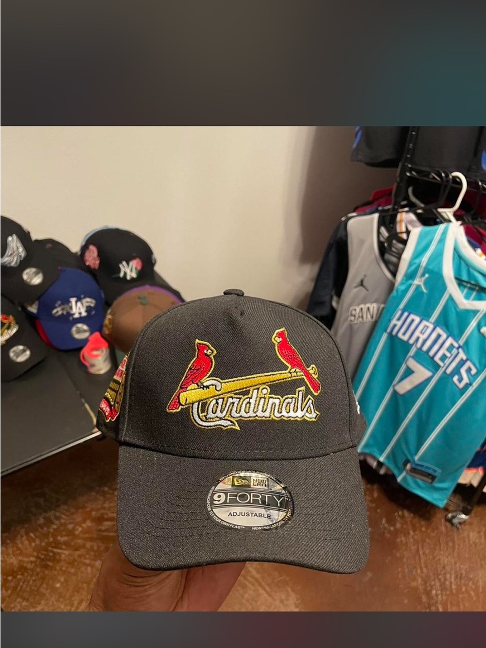 New Era Black St. Louis Cardinals 9FORTY Adjustable Hat with Red and Yellow Logo